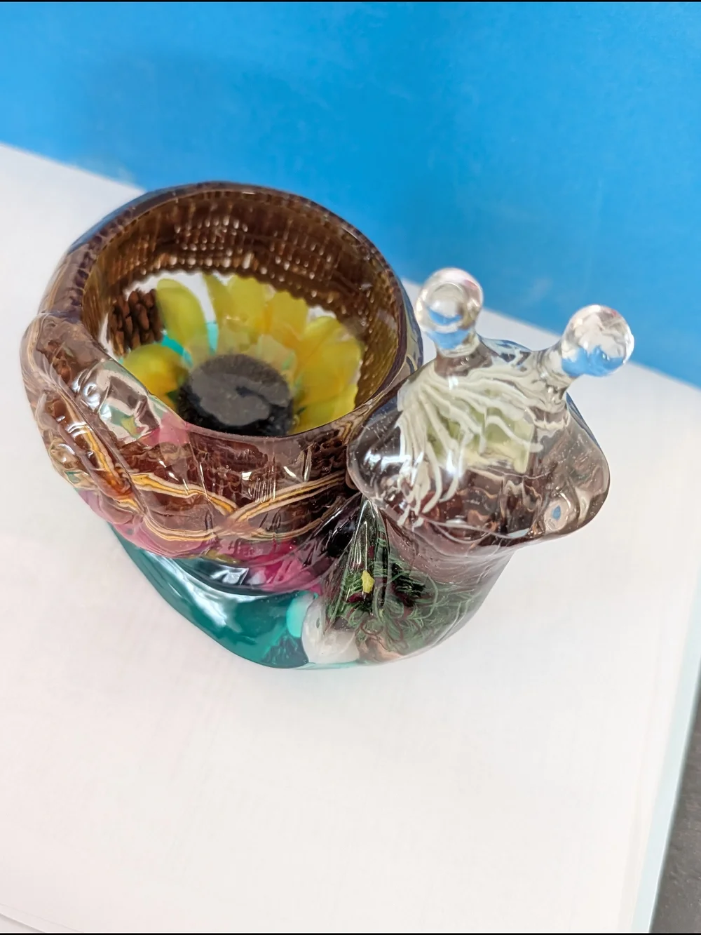 A unique vase in the form of a snail. Handmade.